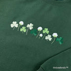 close up shamrock and four leaf clover embroidery detail