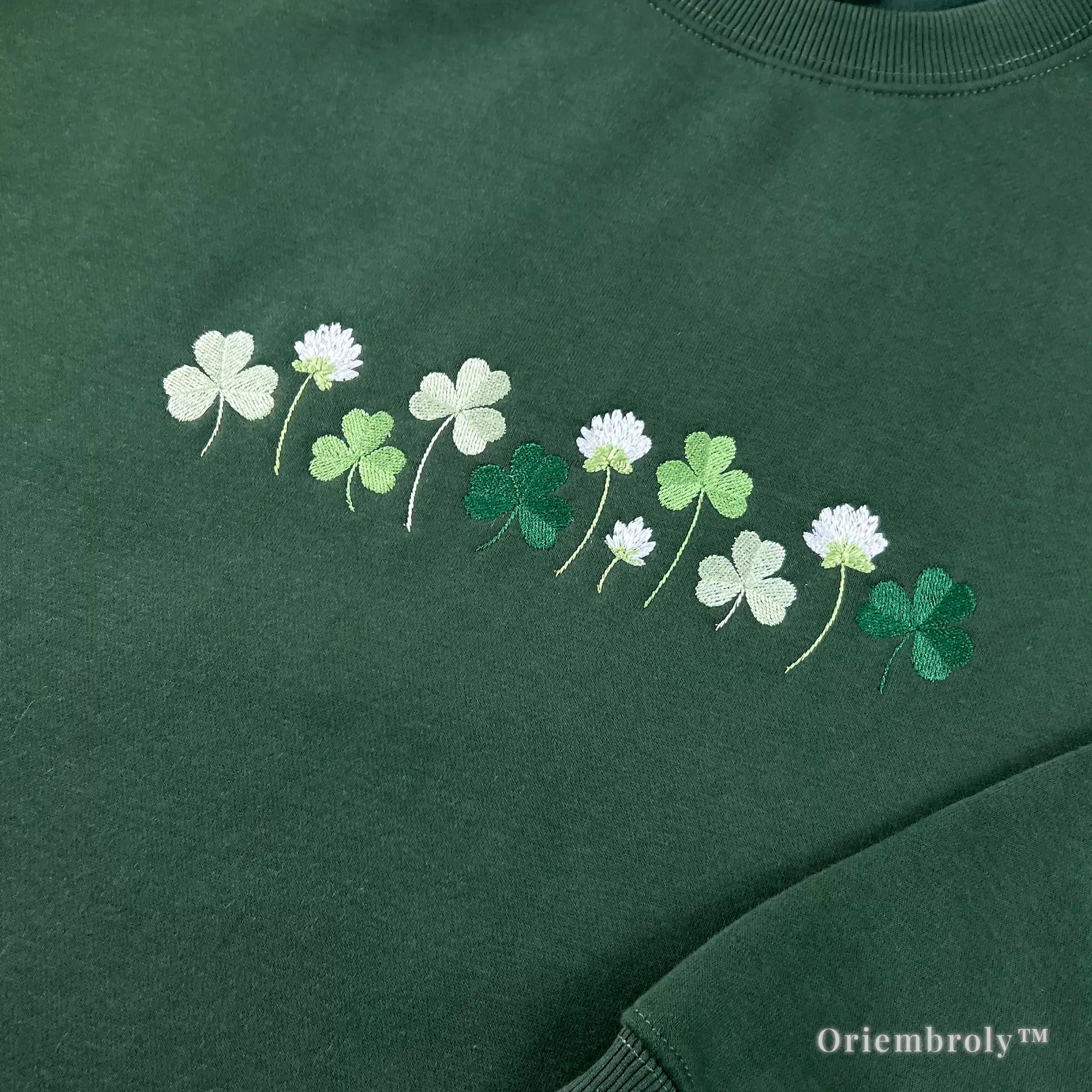 close up shamrock and four leaf clover embroidery detail