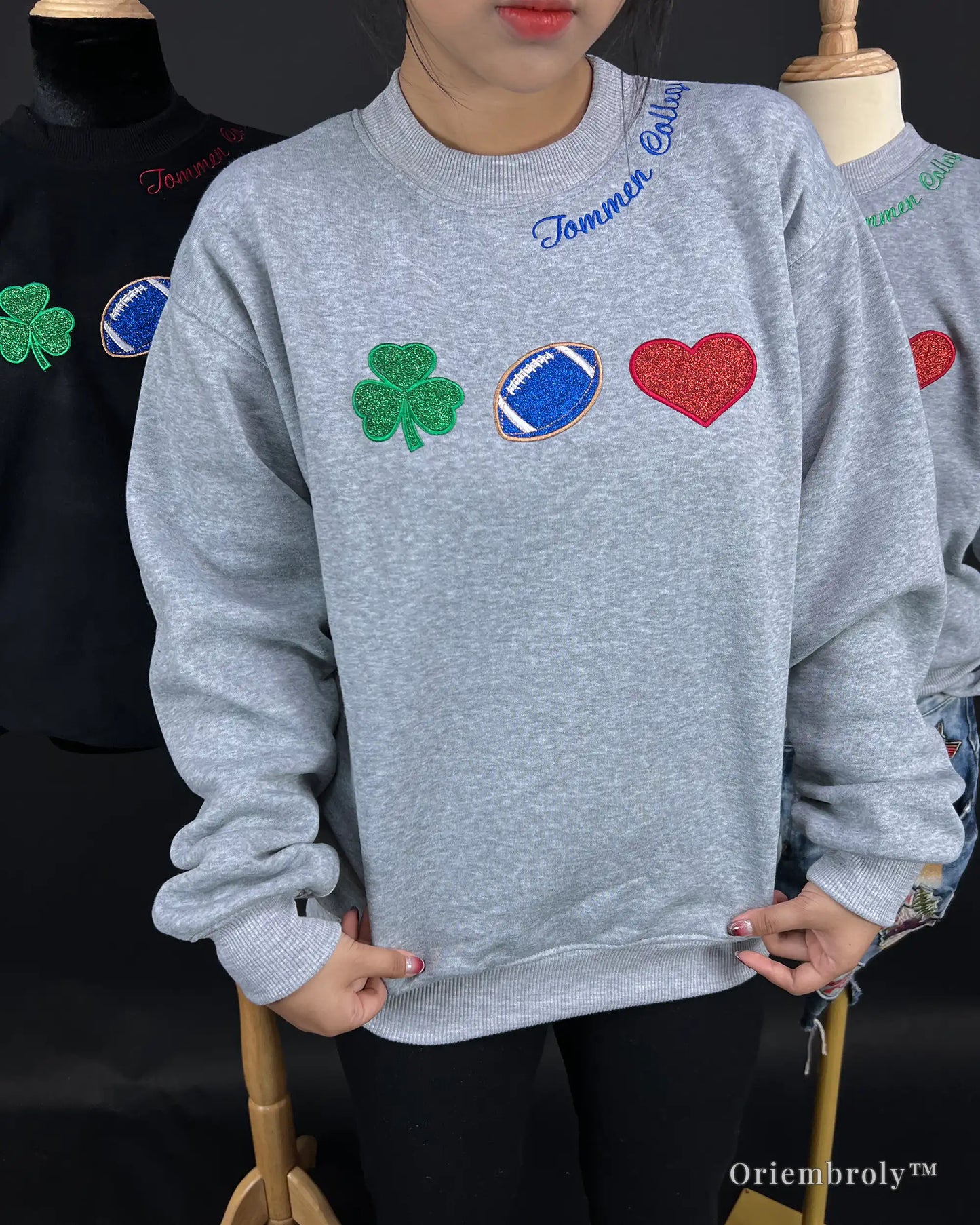 shamrock football heart embroidery icons on varsity sweatshirt