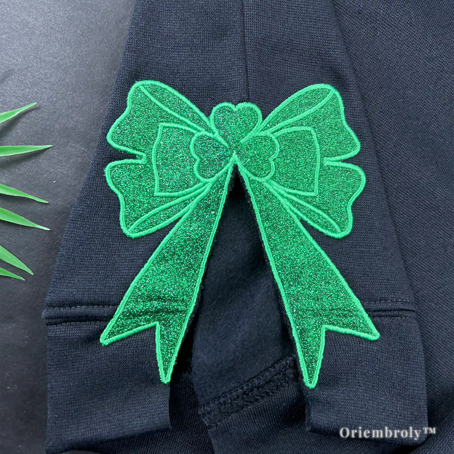 shamrock side bow embroidery detail in emerald green
