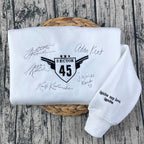 Embroidered Shatter Me sweatshirt featuring Aaron Warner Sector 45 CCR uniform design, perfect for BookTok fans.