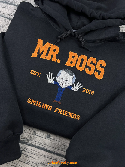 Black hoodie with embroidered winking caricature