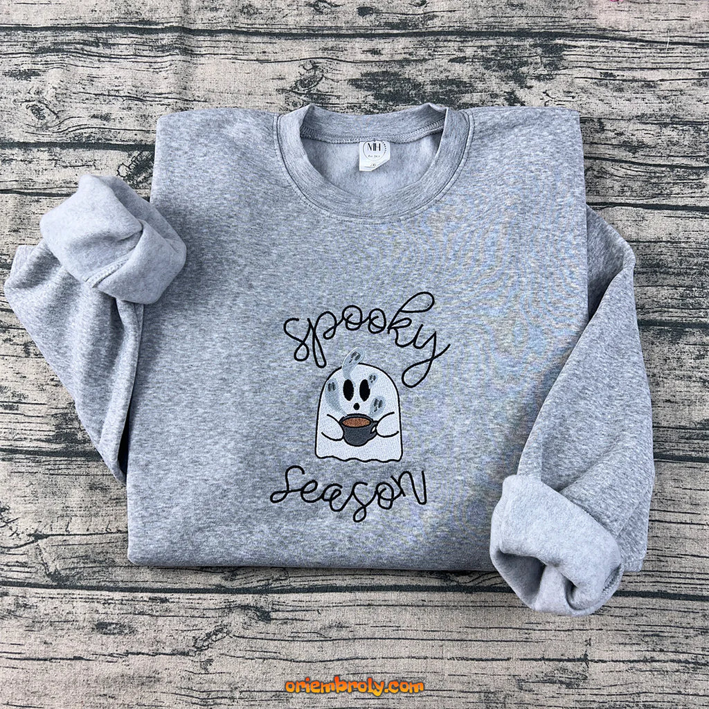 Front view of spooky season embroidered sweatshirt with cute ghost design
