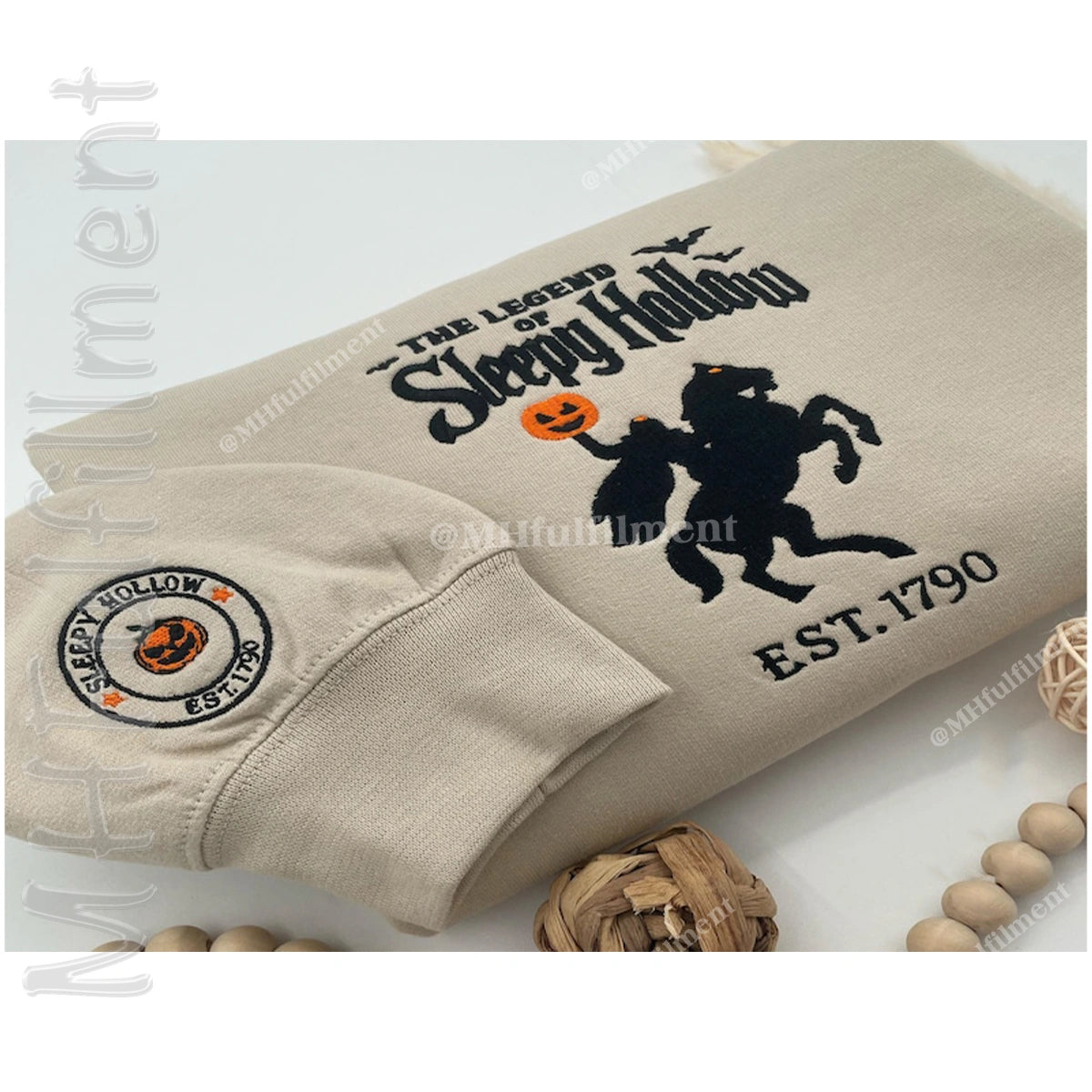 Beige sweatshirt with 'The Legend of Sleepy Hollow' design on a white background