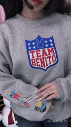 Detailed sleeve patch embroidery on Team Benito sweatshirt