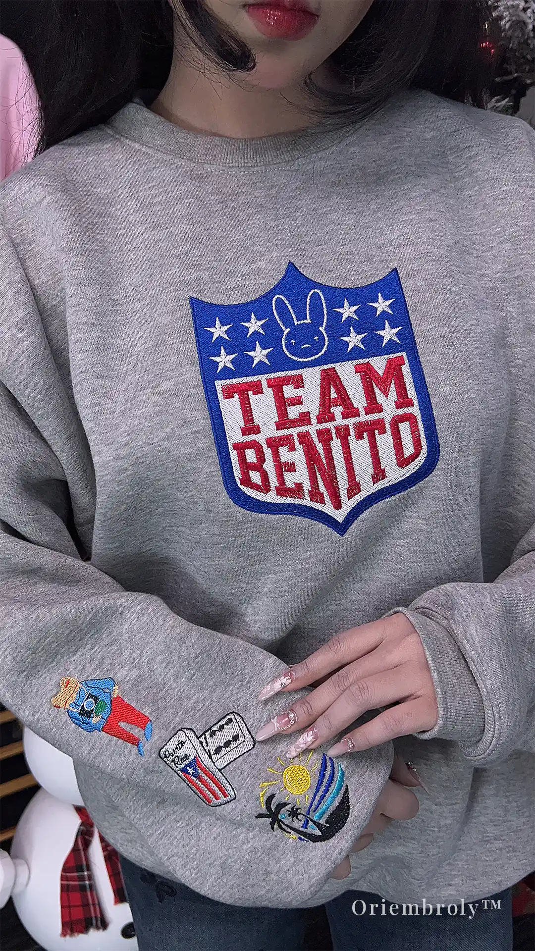 Detailed sleeve patch embroidery on Team Benito sweatshirt