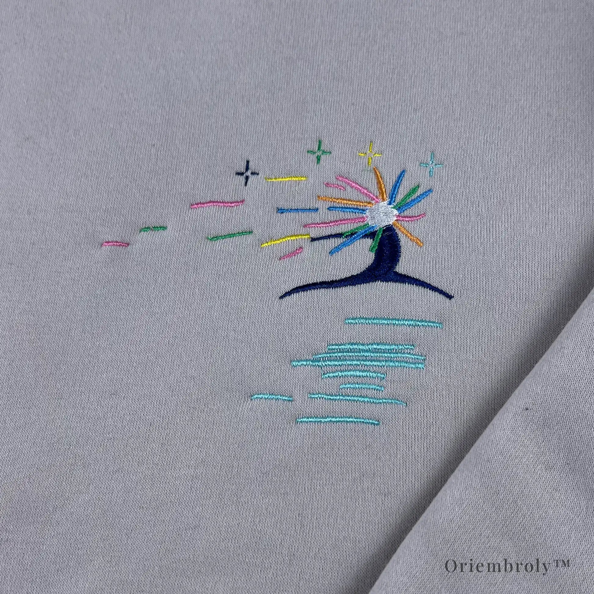 close up satin stitch star spirit embroidery detail