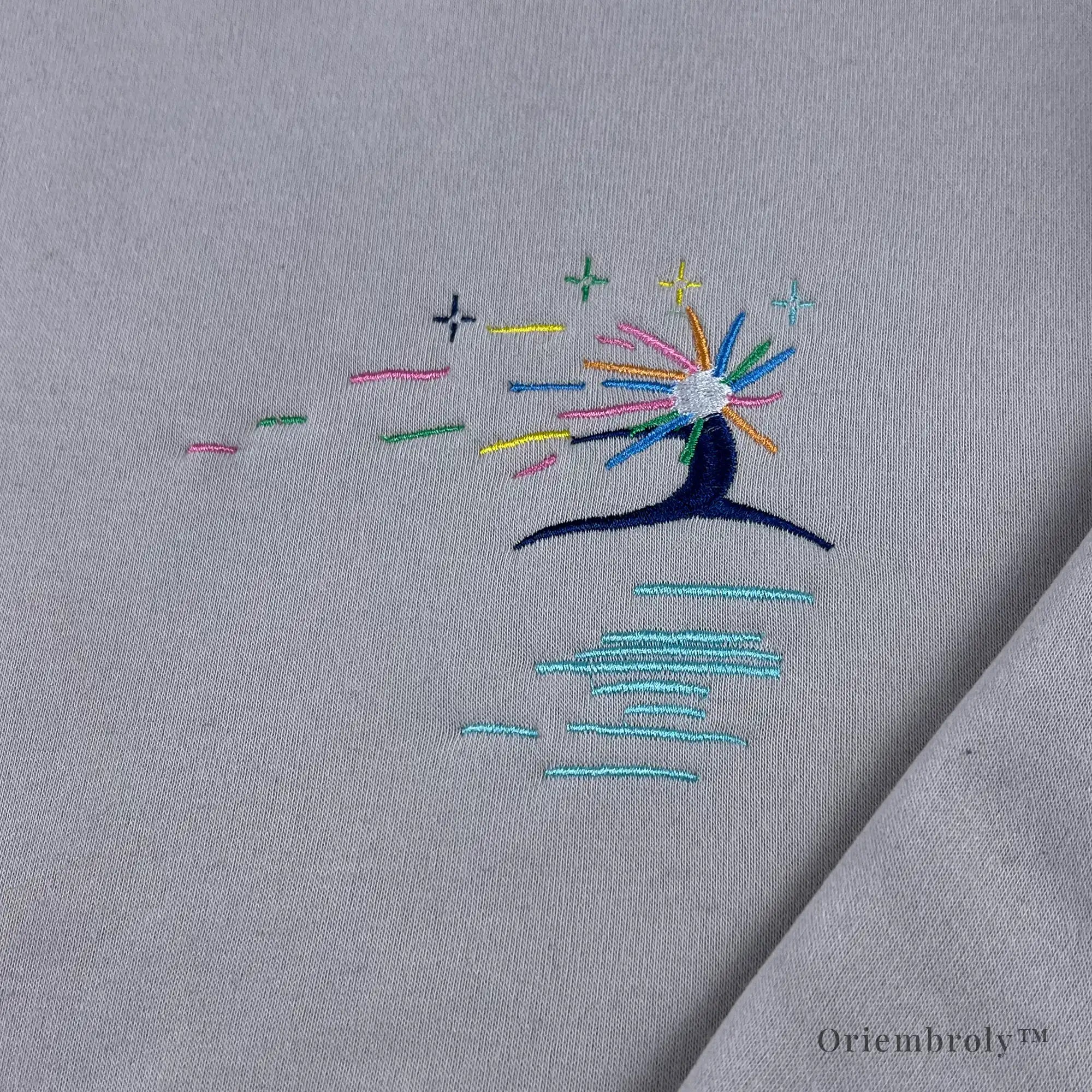 close up satin stitch star spirit embroidery detail