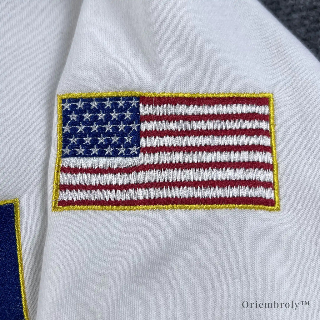 STEM-core fashion staple: white quarter-zip with science and space-themed embroidered patches. Popular choice for science teachers and university students in engineering fields