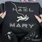 STEM-core aesthetic black pullover with white embroidered astronaut and rocket ship motifs. Minimalist and stylish space-themed streetwear for science teachers, engineers, and astronomy enthusiasts