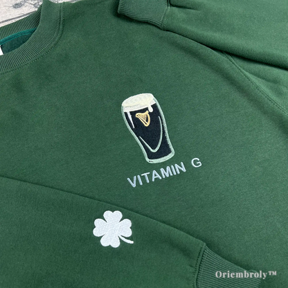 close up embroidered Irish stout pint design on crewneck sweatshirt