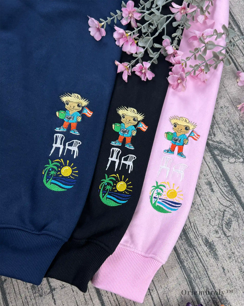 Tropical sunset embroidery on fan crewneck sleeve