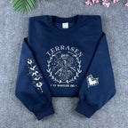 Navy Terrasen Throne of Glass embroidered sweatshirt featuring the stag and "To whatever end" quote