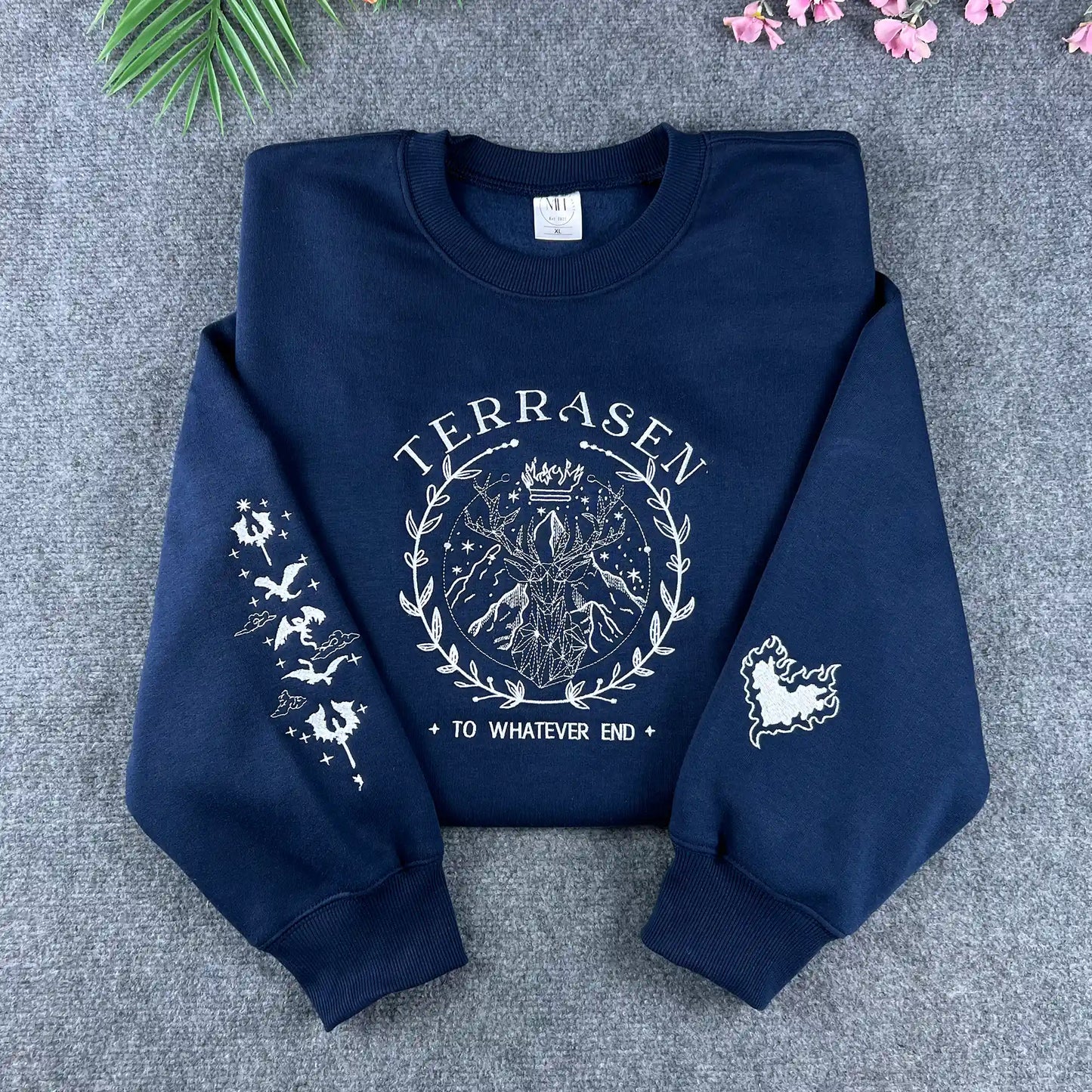 Navy Terrasen Throne of Glass embroidered sweatshirt featuring the stag and "To whatever end" quote