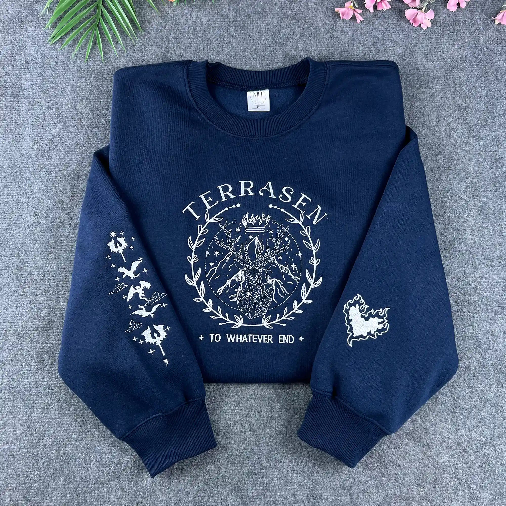 Navy Terrasen Throne of Glass embroidered sweatshirt featuring the stag and "To whatever end" quote