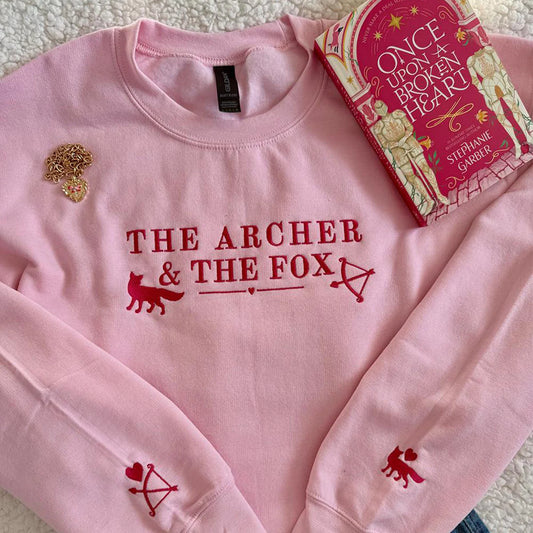 The Archer and the Fox embroidered sweatshirt, perfect fantasy reader shirt for book lovers and epic fantasy fans.