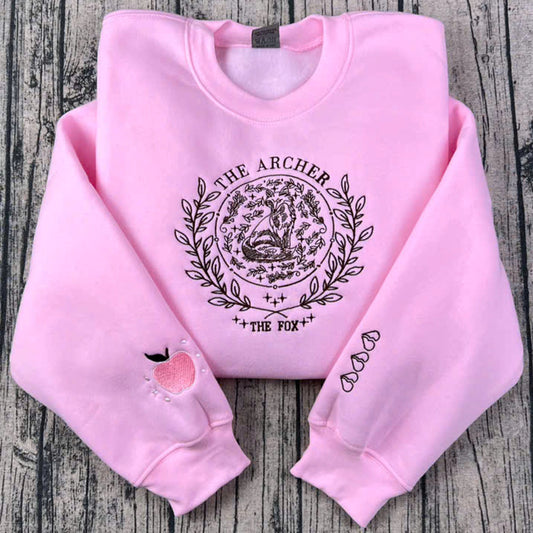 The Archer and The Fox embroidered sweatshirt, Once Upon A Broken Heart hoodie, and Jack's Apple sweatshirt – perfect bookish shirts for fantasy lovers.