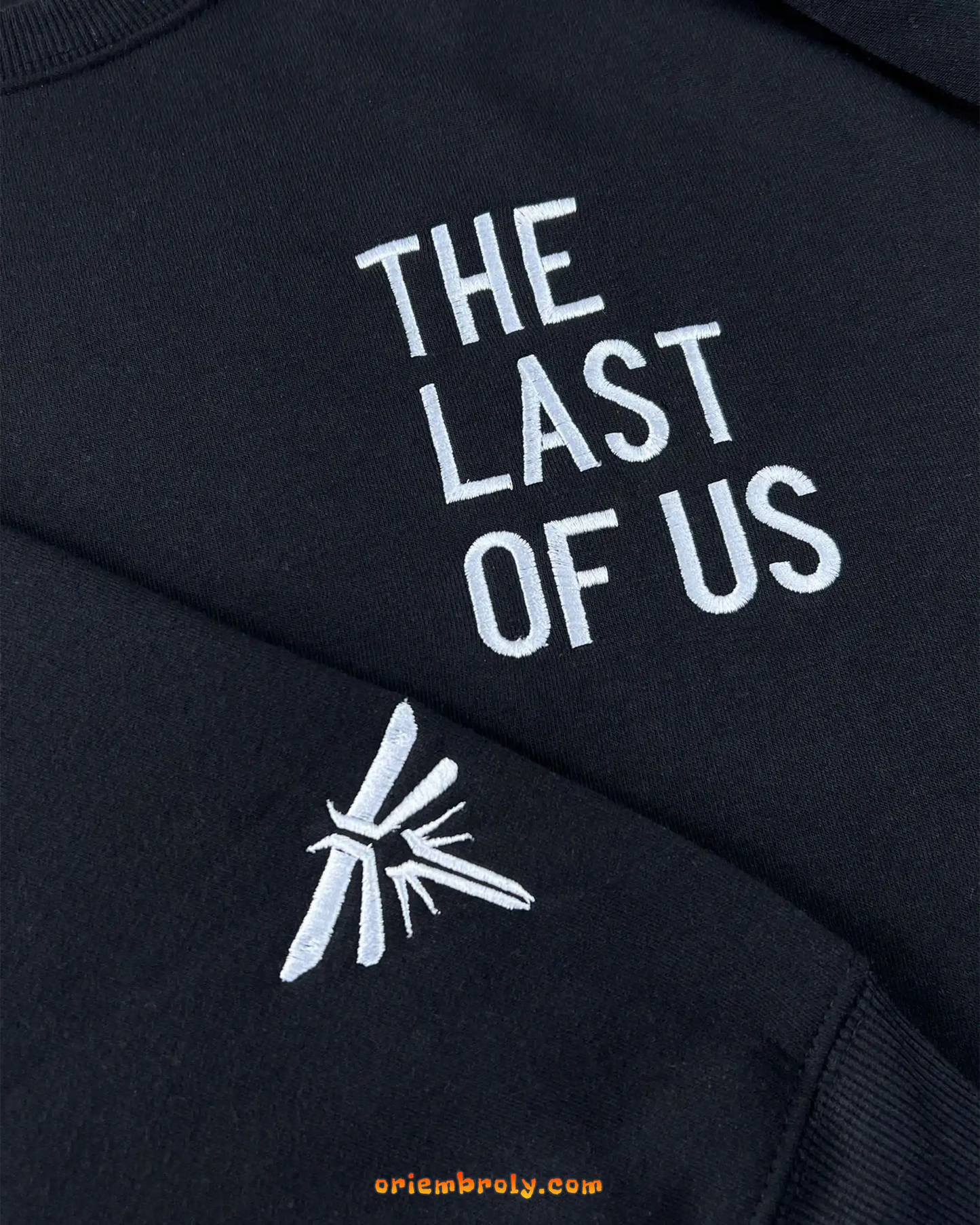 Distressed embroidered The Last of Us title on chest