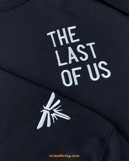 Distressed embroidered The Last of Us title on chest
