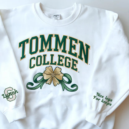 Preppy embroidered Tommen College sweatshirt with a bow and clovers, perfect for varsity aesthetic lovers.