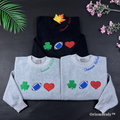 Tommen College varsity embroidered crewneck with shamrock football heart icons