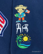 Embroidered character patch on Team Benito sweatshirt sleeve