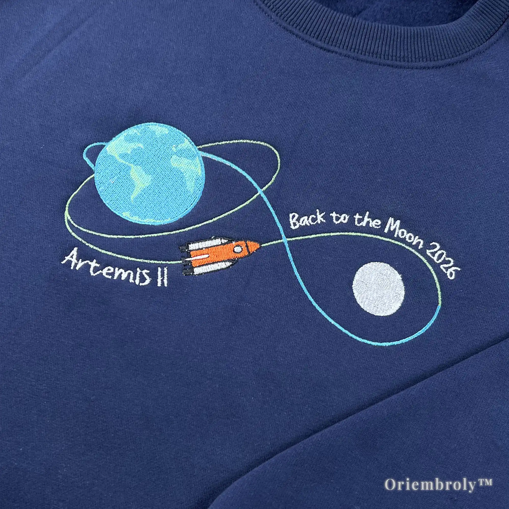 An embroidered NASA Artemis II "Back to the Moon 2026" sweatshirt. A perfect and unique gift idea for astronomy lovers, science teachers, and future astronauts