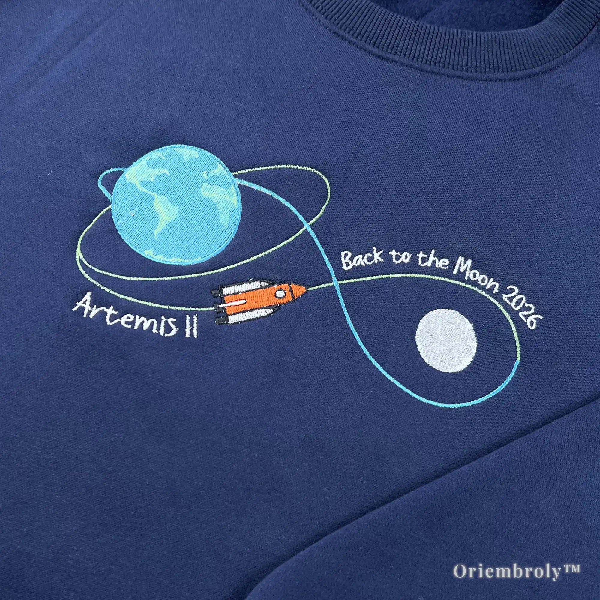 An embroidered NASA Artemis II "Back to the Moon 2026" sweatshirt. A perfect and unique gift idea for astronomy lovers, science teachers, and future astronauts