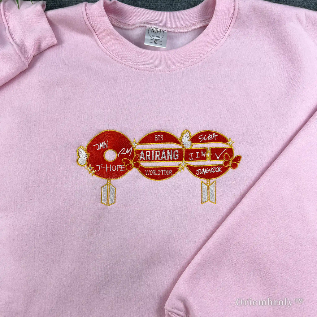 Unisex K-pop style white sweatshirt with vibrant red BTS-inspired embroidery