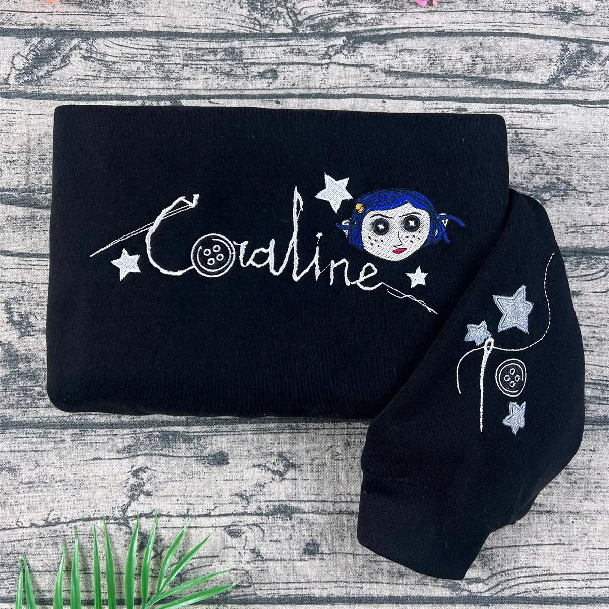 Button eyed doll embroidery on unisex crewneck