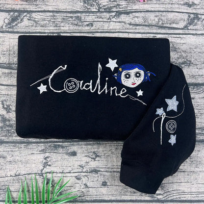 Button eyed doll embroidery on unisex crewneck