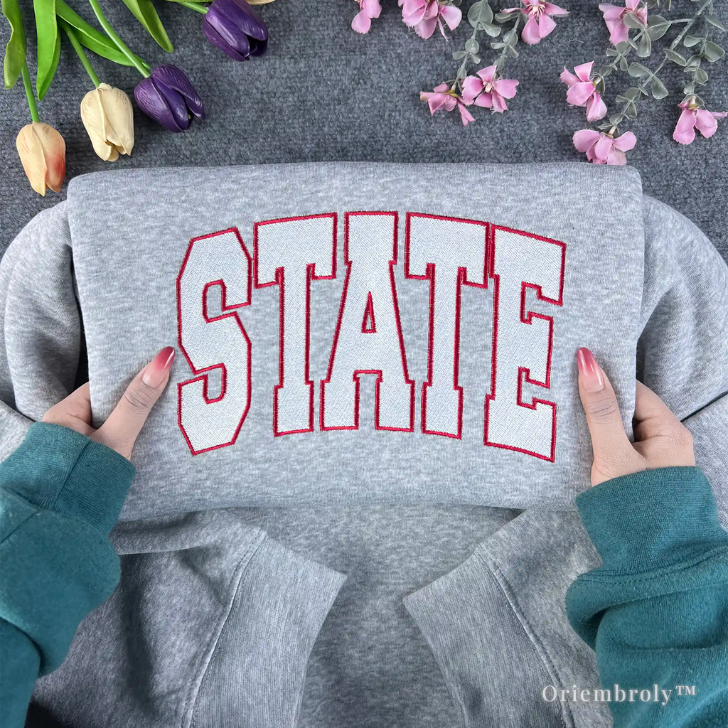varsity embroidered sweatshirt with state lettering design