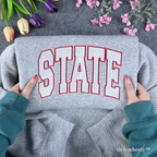 varsity embroidered sweatshirt with state lettering design