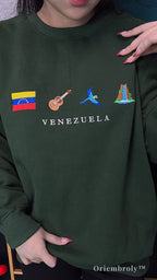 model wearing Venezuela embroidered sweatshirt casually
