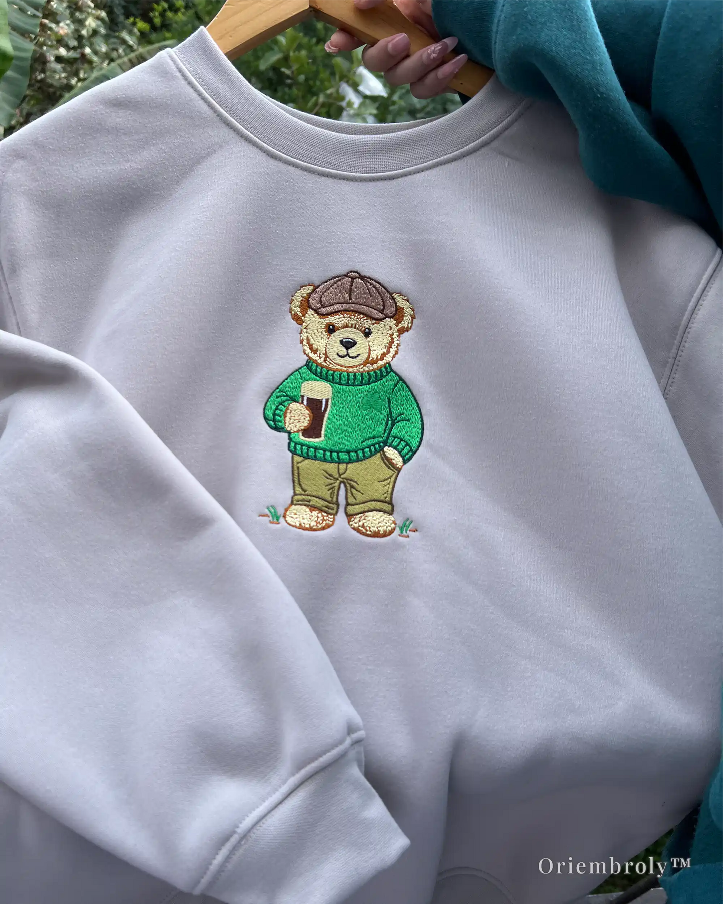 vintage style embroidered bear crewneck flat lay
