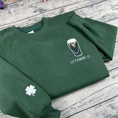 forest green Vitamin G embroidered St Patrick's Day sweatshirt flat lay