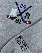 “We didn’t even kiss” embroidered cuff on romance sweatshirt