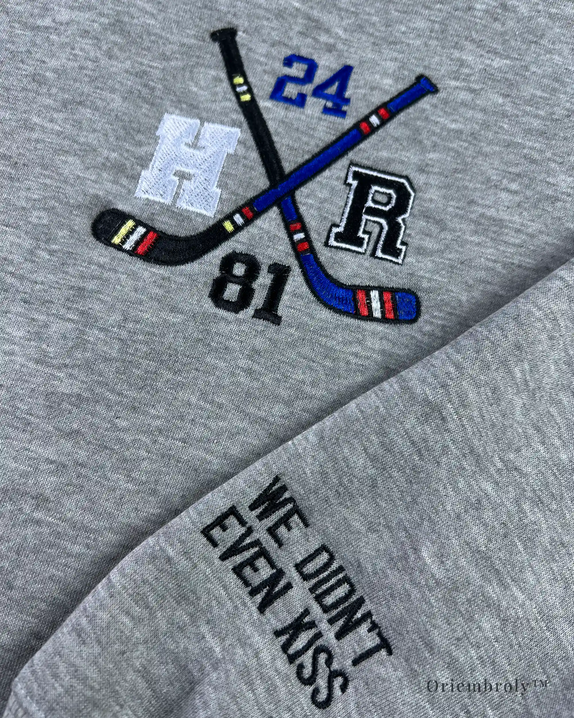 “We didn’t even kiss” embroidered cuff on romance sweatshirt