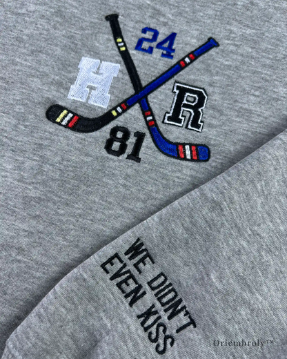 “We didn’t even kiss” embroidered cuff on romance sweatshirt