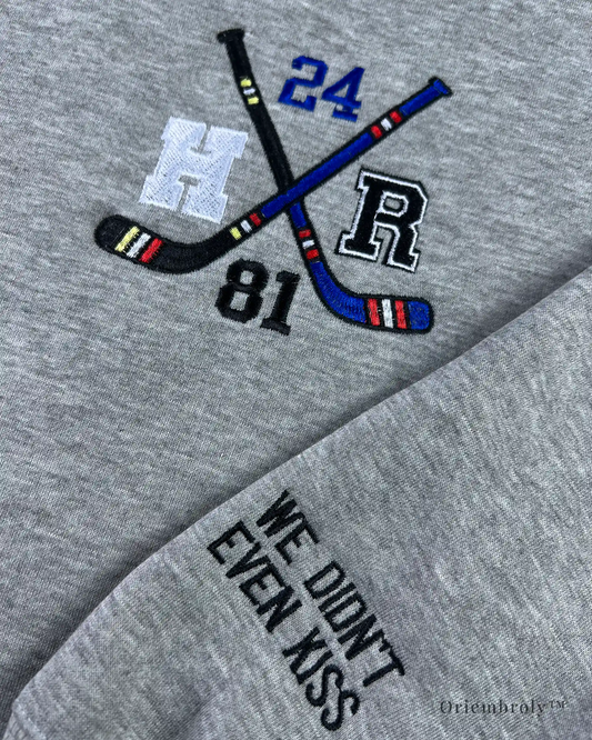 “We didn’t even kiss” embroidered cuff on romance sweatshirt