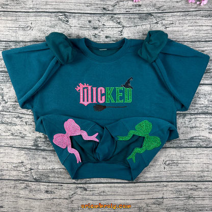 Wicked Glitter Side Bow embroidered sweatshirt with Defy Gravity design