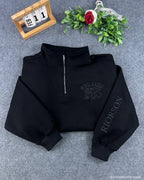 Metallic gold dragon embroidery on black quarter zip