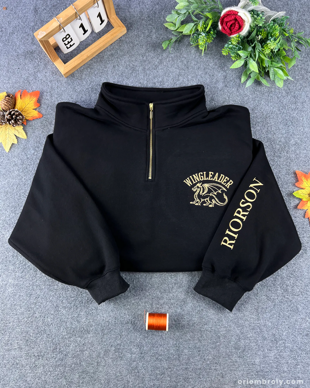 Wingleader embroidered quarter zip sweatshirt with metallic gold dragon design