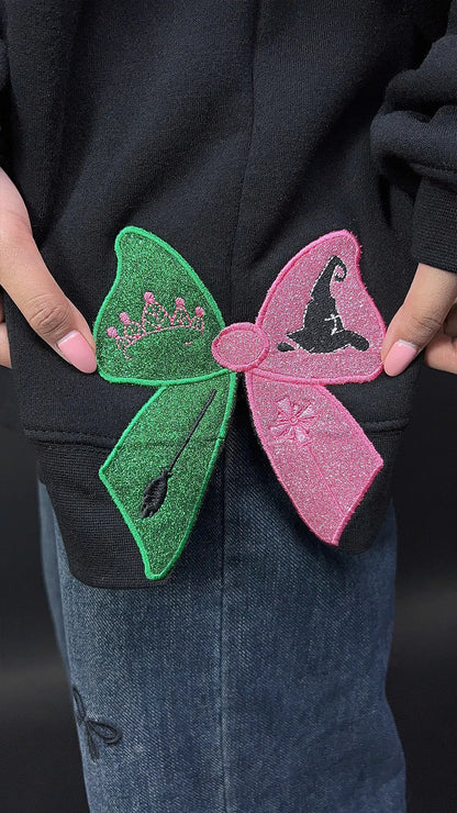 Wizard of Oz inspired Wicked movie hoodie – unique embroidered sweatshirt for theater enthusiasts and musical collectors.