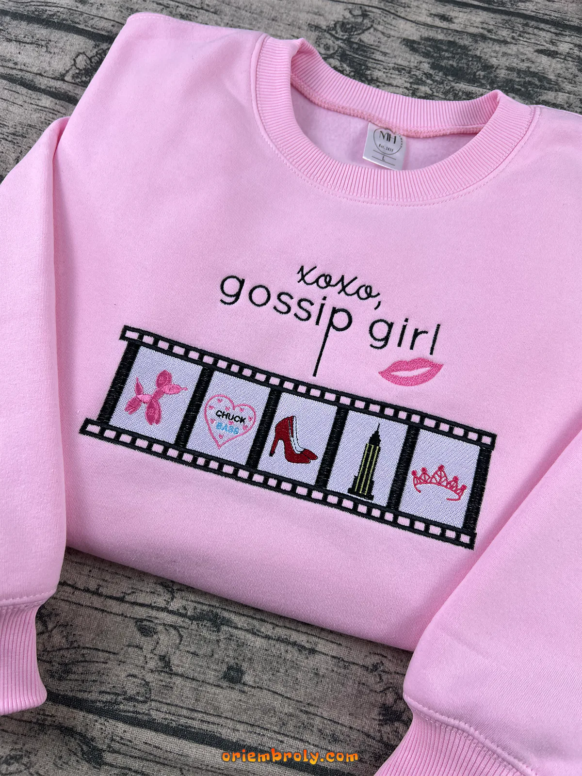 Women’s pink crewneck with Gossip Girl symbols