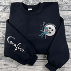 Halloween sweatshirt featuring Coraline horror design