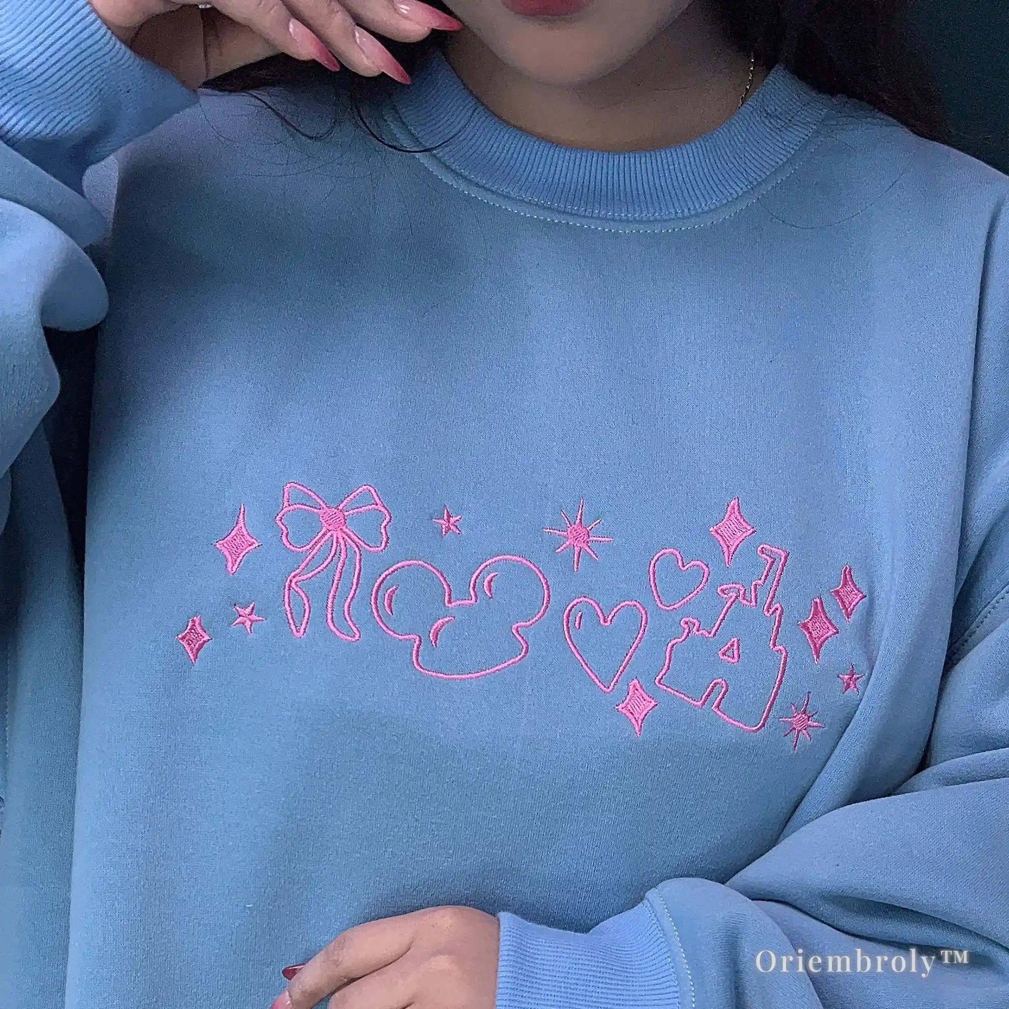 Y2K aesthetic embroidered crewneck sweatshirt flat lay